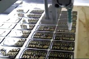 標(biāo)牌灌膠機